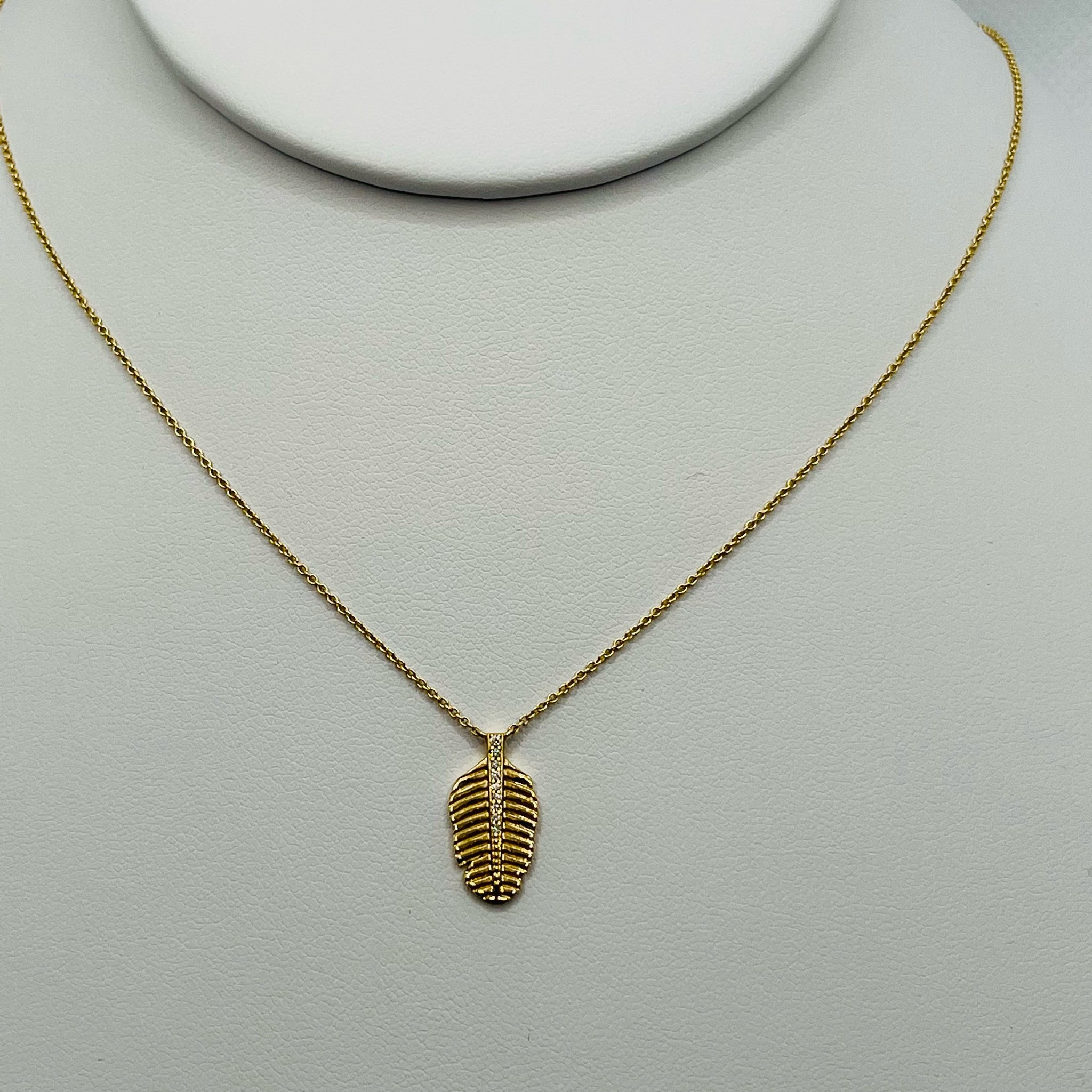 diamond and gold feather