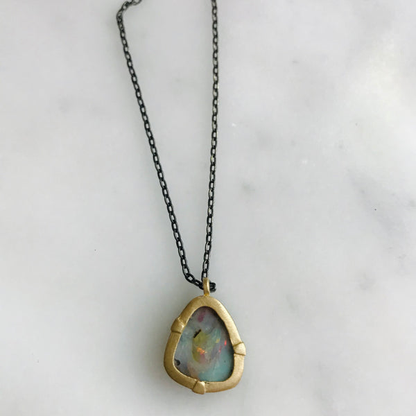 australian boulder opal set in 14k gold with a sterling silver + gold chain