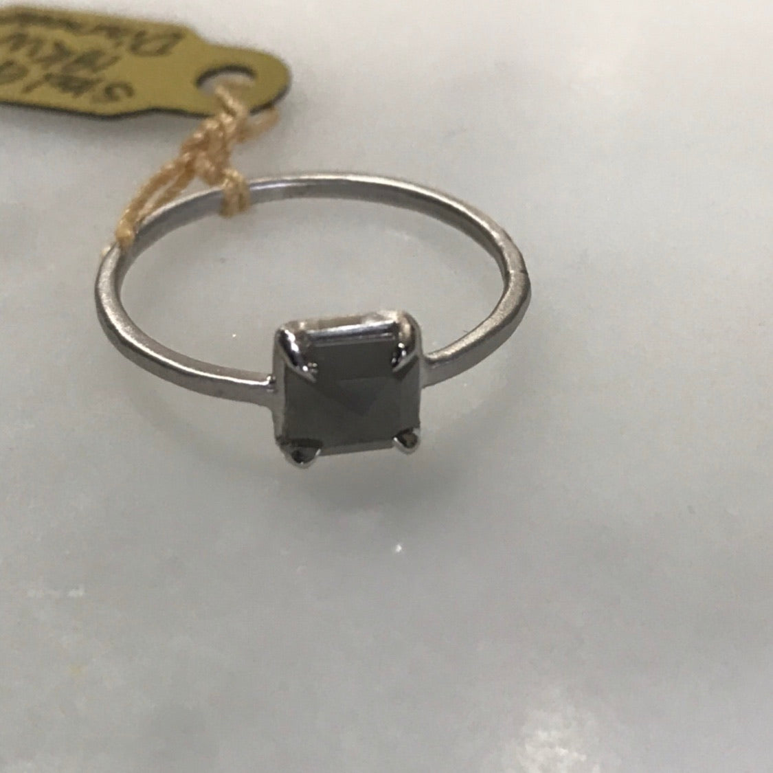grey diamond set in 18k white gold