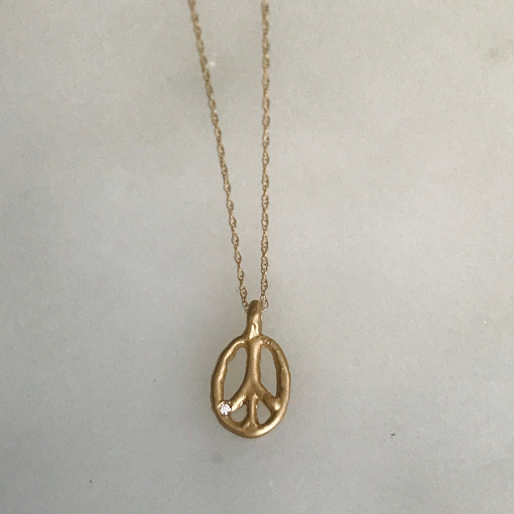 14k gold peace sign necklace with diamond