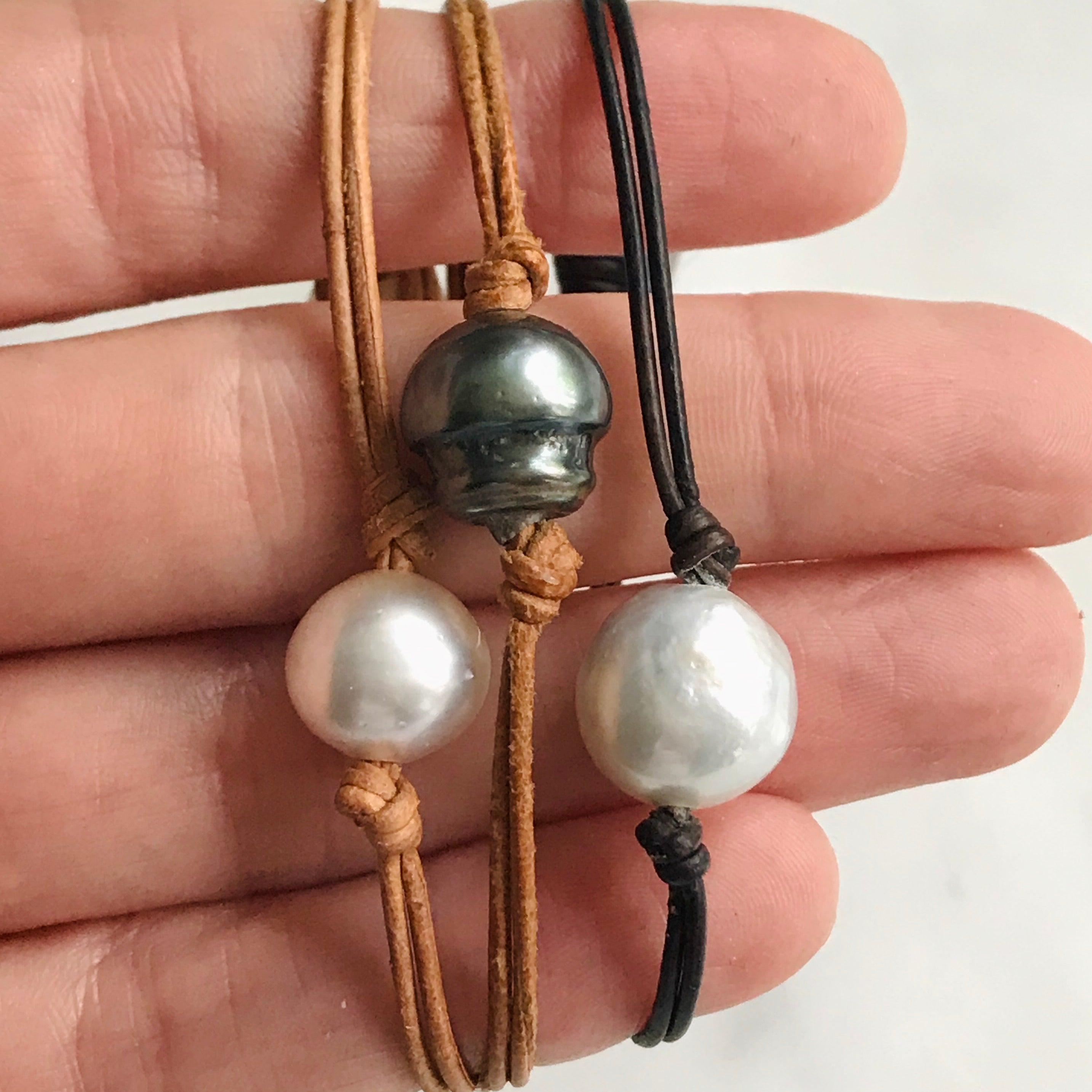 single pearl on leather bracelet