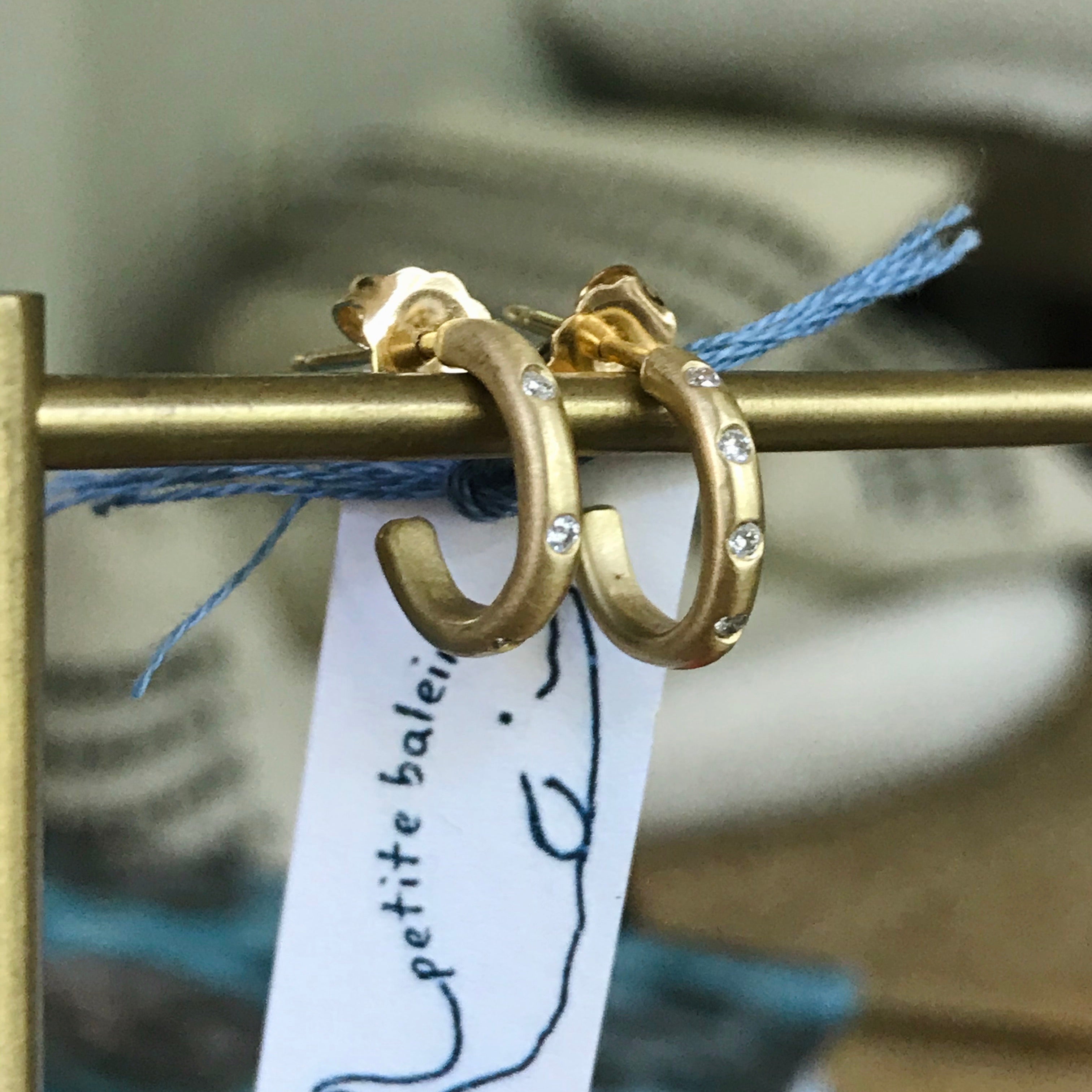 18k gold baby hoops with scattered diamonds