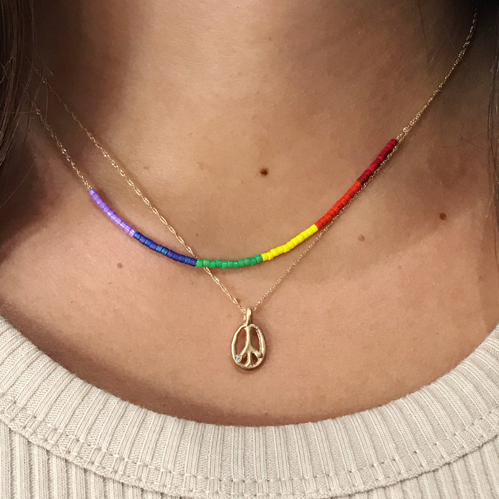 14k gold peace sign necklace with diamond