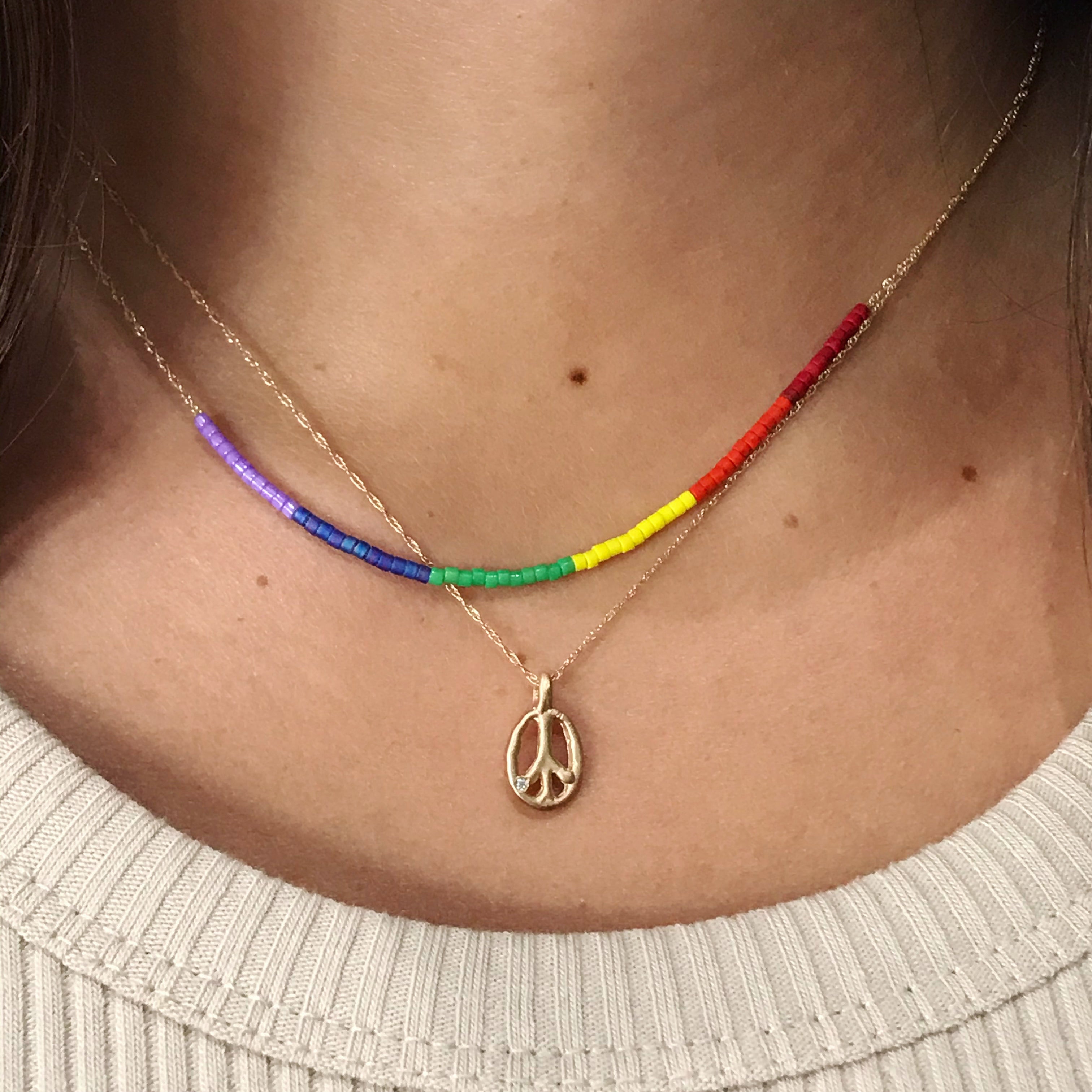 14k gold peace sign necklace with diamond