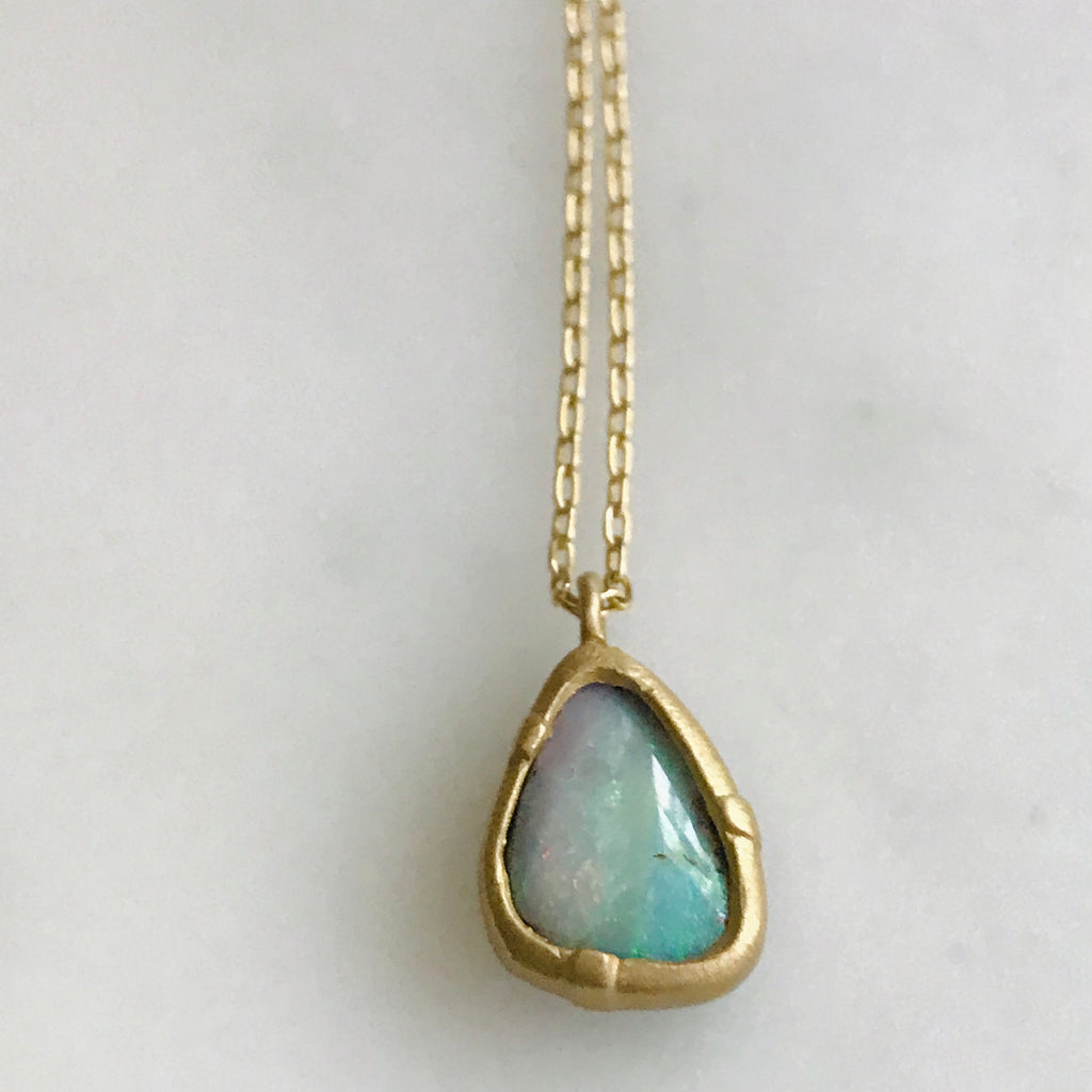 australian boulder opal set in 14k gold with gold chain