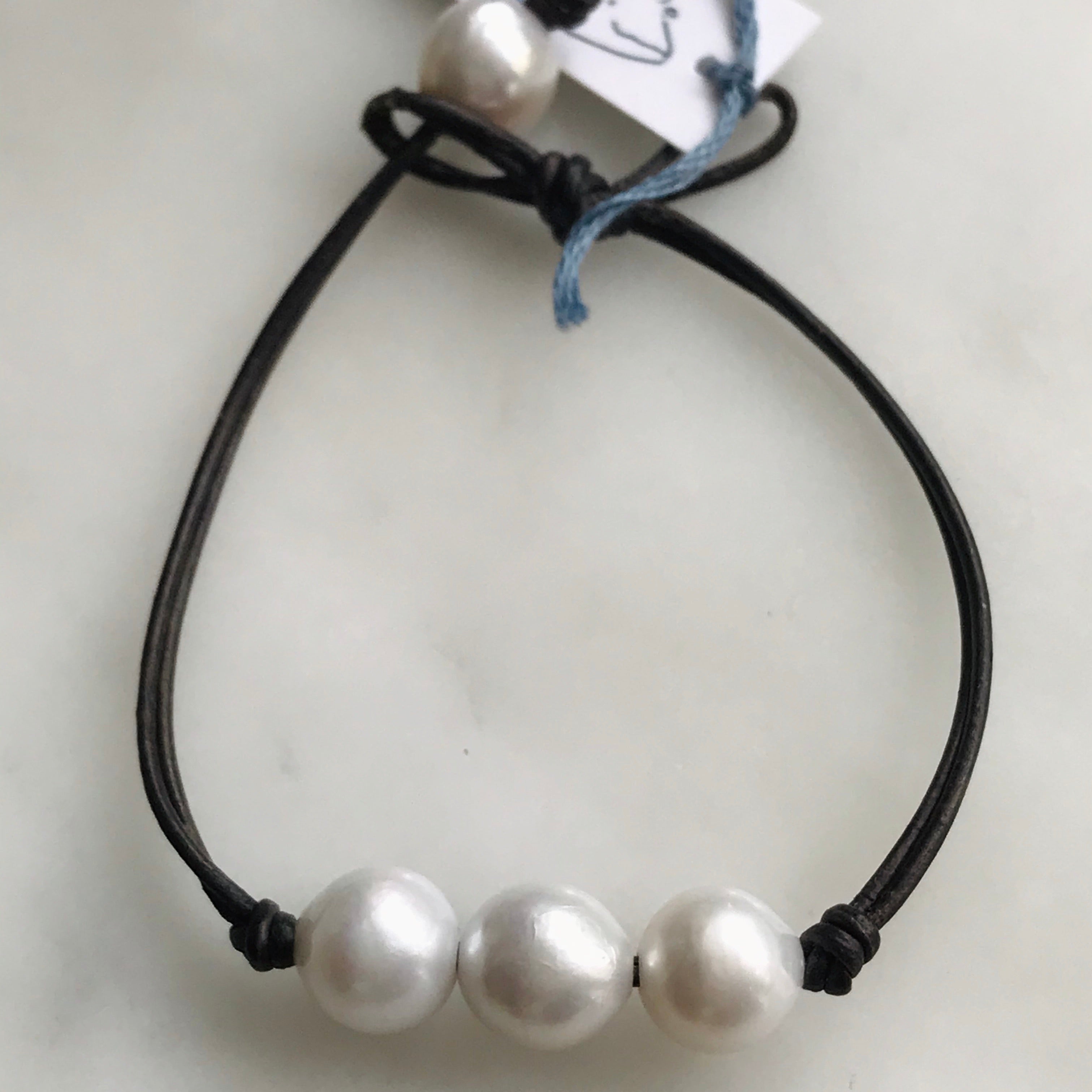 triple pearl bracelet on leather