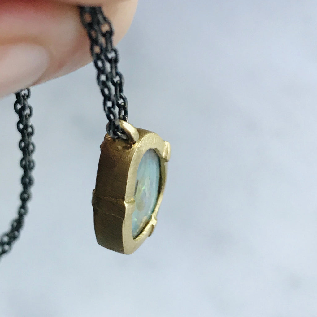 australian boulder opal set in 14k gold with a sterling silver + gold chain
