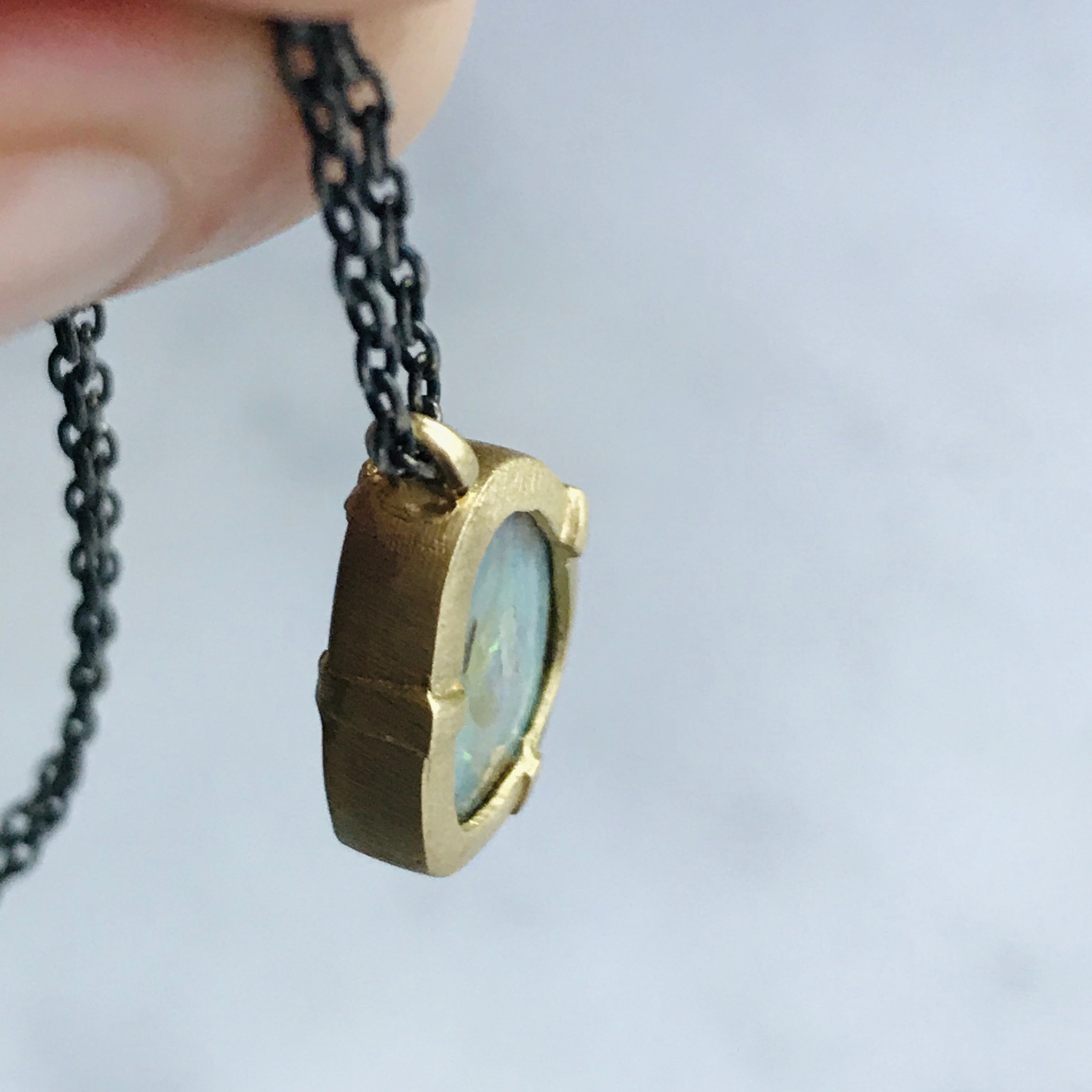 australian boulder opal set in 14k gold with a sterling silver + gold chain