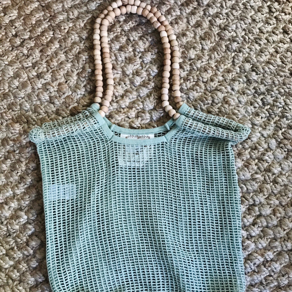 cotton mesh bag with wooden beaded handle