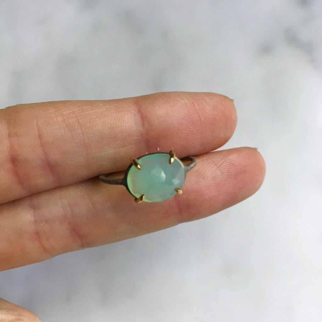 oval peruvian opal 18k gold prongs silver band